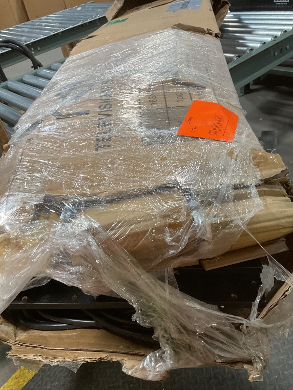 Photo 1 of **SELLING FOR PARTS. CORD DAMAGE. EDGE DAMAGE ON BOARD.**Bed frame with plugin. Size unknown