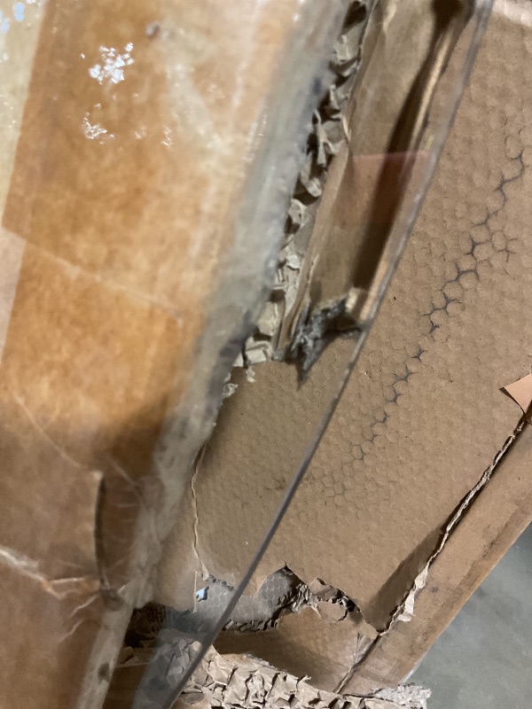 Photo 1 of **SCRAPE ON EDGE ONE SIDE**55*55 clear tempered glass chair mat