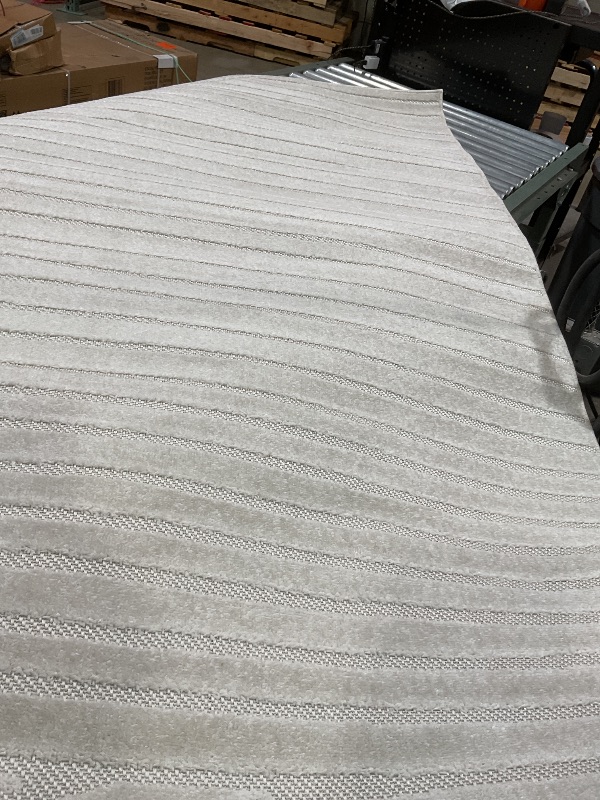 Photo 1 of **DIRT FROM TRANSPORT **JONATHAN Y Hallie High-Low Curve Ivory/Cream Indoor/Outdoor Area Rug, 8x10, Minimalist, Pet Friendly, Non-Shedding, Stain Resistant, Hose-Washable for Backyard, Patio, Porch (SCN100B-8)