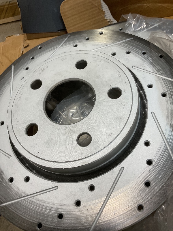 Photo 1 of ** ROTORS ONLY. DIRT FROM TRANSPORT** TRQ Front Brake Pad and Rotor Set Ceramic Drilled Slotted Coated Rotors Compatible with 2011-2016 Dodge Durango Grand Cherokee