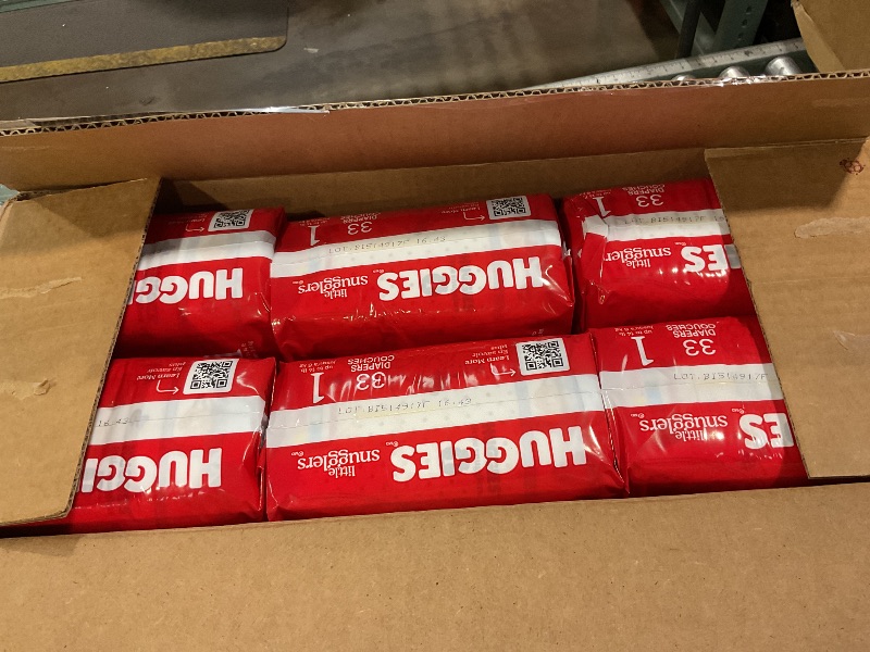 Photo 1 of **6 PACK 33 COUNT** Huggies Size 1 Diapers