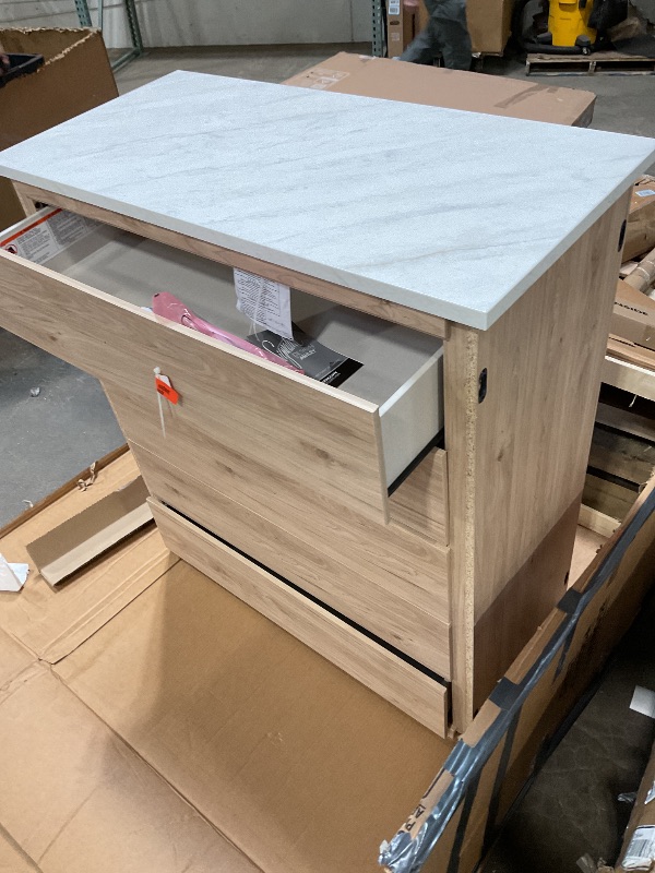 Photo 1 of **TRUCK PICK UP ONLY** Signature Design by Ashley Cadmori Bohemian 5-Drawer Chest of Drawers with Safety Stop and Post Legs, White & Light Brown