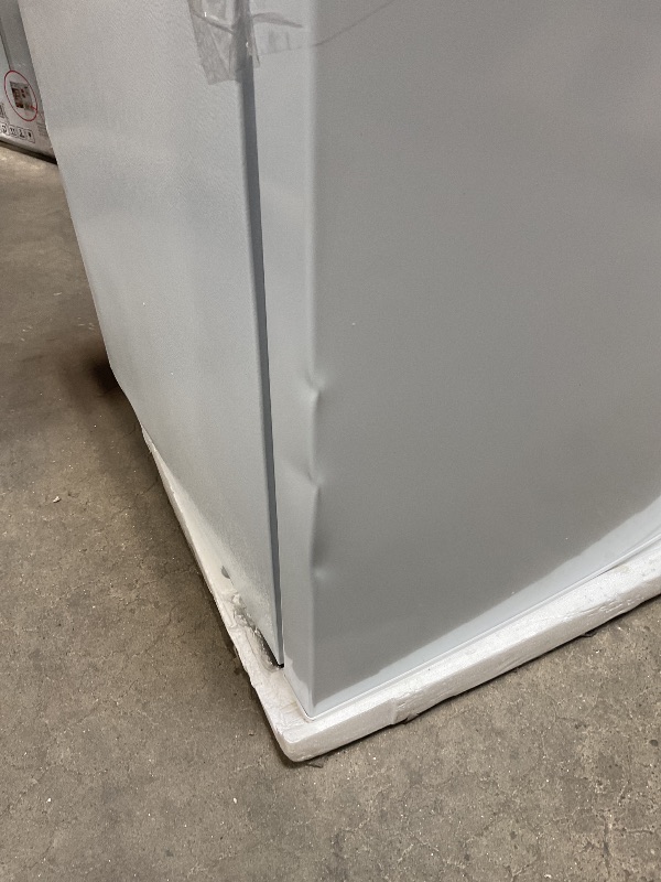 Photo 1 of ***MINOR DAMAGE ***Frigidaire Mini Refrigerator, Compact Freezer Compartment, Adjustable Thermostat Control, Reversible Door, Contemporary Series, 4.5 cu ft, White