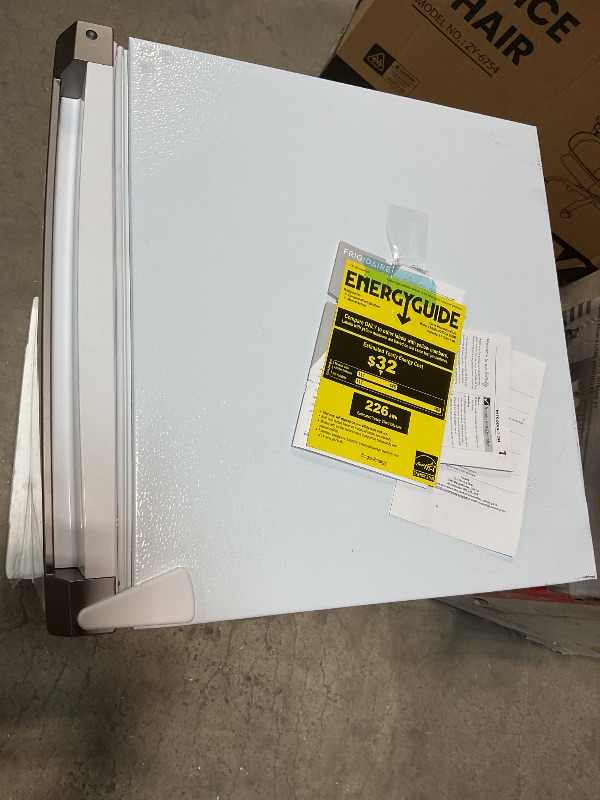Photo 1 of ***MINOR DAMAGE ***Frigidaire Mini Refrigerator, Compact Freezer Compartment, Adjustable Thermostat Control, Reversible Door, Contemporary Series, 4.5 cu ft, White