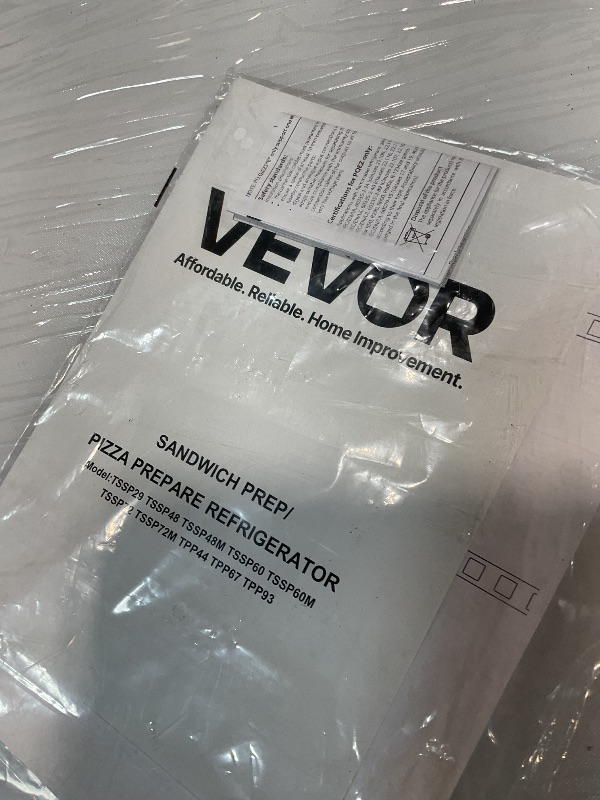 Photo 1 of **DIRT**VEVOR 67"W Commercial Refrigerator, Pizza Prep Refrigerated Table, 19.3" Ultra Wide Countertop Food Prep Fridge, 20.3 Cu.Ft Single Door Salad Prep Fridge, 9 Pans Pizza Make Worktop with Cutting Board