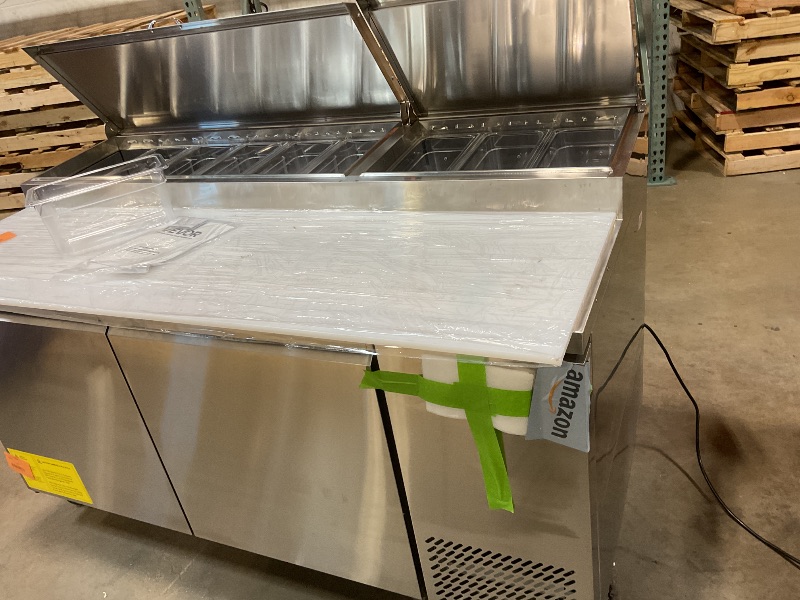 Photo 1 of **DIRT**VEVOR 67"W Commercial Refrigerator, Pizza Prep Refrigerated Table, 19.3" Ultra Wide Countertop Food Prep Fridge, 20.3 Cu.Ft Single Door Salad Prep Fridge, 9 Pans Pizza Make Worktop with Cutting Board