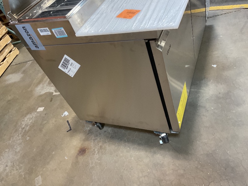 Photo 1 of **DIRT**VEVOR 67"W Commercial Refrigerator, Pizza Prep Refrigerated Table, 19.3" Ultra Wide Countertop Food Prep Fridge, 20.3 Cu.Ft Single Door Salad Prep Fridge, 9 Pans Pizza Make Worktop with Cutting Board