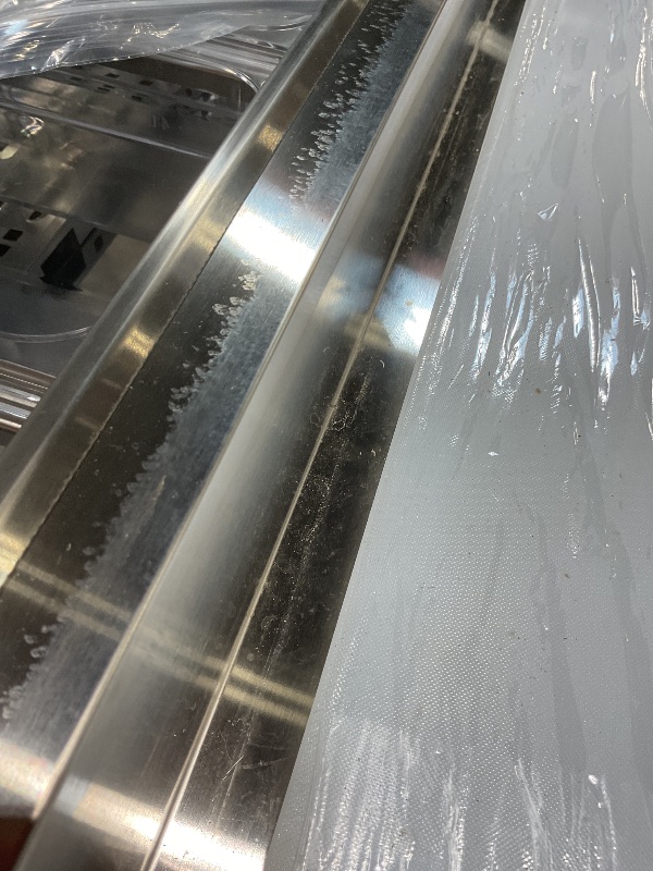 Photo 1 of **DIRT**VEVOR 67"W Commercial Refrigerator, Pizza Prep Refrigerated Table, 19.3" Ultra Wide Countertop Food Prep Fridge, 20.3 Cu.Ft Single Door Salad Prep Fridge, 9 Pans Pizza Make Worktop with Cutting Board