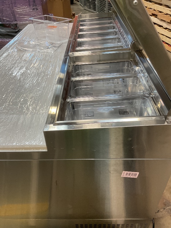 Photo 1 of **DIRT**VEVOR 67"W Commercial Refrigerator, Pizza Prep Refrigerated Table, 19.3" Ultra Wide Countertop Food Prep Fridge, 20.3 Cu.Ft Single Door Salad Prep Fridge, 9 Pans Pizza Make Worktop with Cutting Board