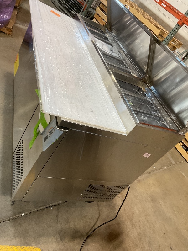 Photo 1 of **DIRT**VEVOR 67"W Commercial Refrigerator, Pizza Prep Refrigerated Table, 19.3" Ultra Wide Countertop Food Prep Fridge, 20.3 Cu.Ft Single Door Salad Prep Fridge, 9 Pans Pizza Make Worktop with Cutting Board