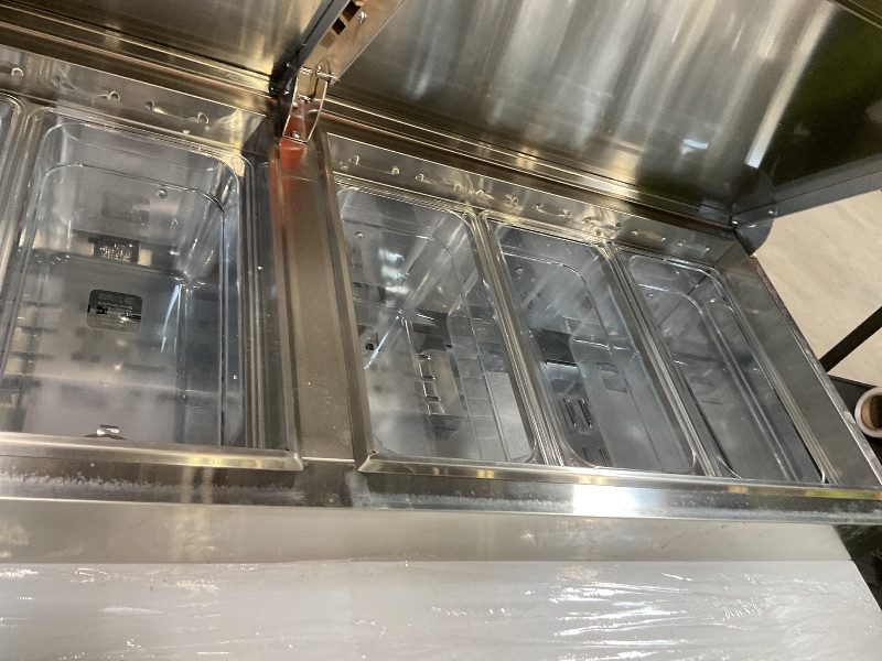 Photo 1 of **DIRT**VEVOR 67"W Commercial Refrigerator, Pizza Prep Refrigerated Table, 19.3" Ultra Wide Countertop Food Prep Fridge, 20.3 Cu.Ft Single Door Salad Prep Fridge, 9 Pans Pizza Make Worktop with Cutting Board