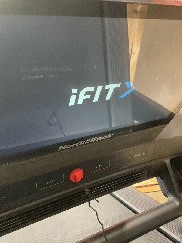 Photo 1 of **DIRT. SCRAPES. THE BAR TO CHANGE TREADMILL ANGLE IS BENT.**NordicTrack Commercial 1750 Treadmill with iFIT