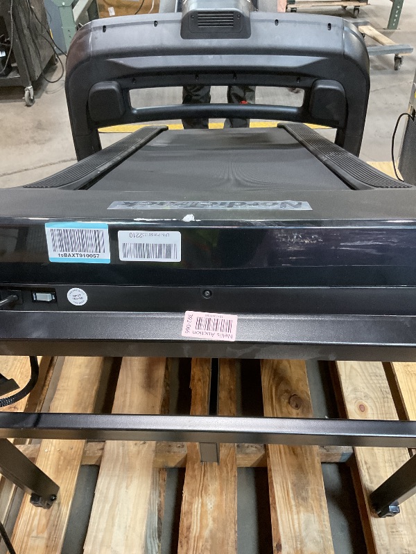 Photo 1 of **DIRT. SCRAPES. THE BAR TO CHANGE TREADMILL ANGLE IS BENT.**NordicTrack Commercial 1750 Treadmill with iFIT