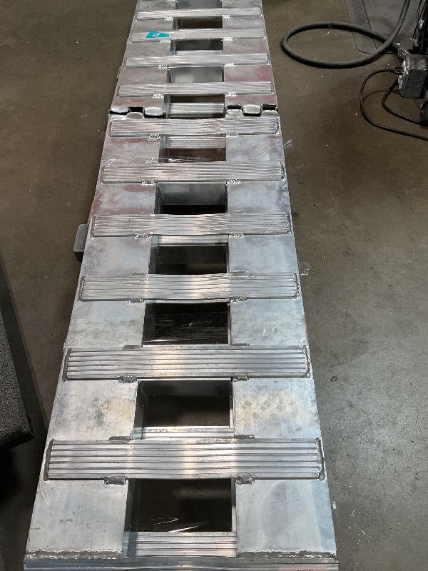 Photo 1 of **FOR RECYCLED PARTS ONLY/ COMPLETELY DAMAGED AND SPLIT DOWN THE SIDES** Labwork Aluminum 84 x 15 Inch Ramps, 6000LBS, 2 Ramps, Hook Ramp Attachment End