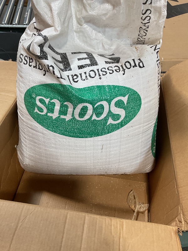 Photo 1 of **MINOR HOLE**Scotts Professional Turfgrass Seed Sun and Shade Mix, Uncoated, 99.9% Weed Free, 50 lbs.