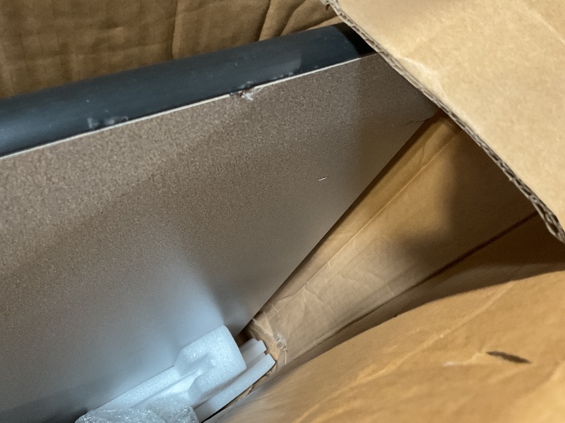 Photo 1 of **DENTS AND SCRATCHES ON FRONT. DAMAGE TO CORNERAmazon Basics Adjustable Rectangular Classroom Activity Table, Writing Desk, Adjustable Height 19-30 Inch, Grey Top/Black Edge, 47" W x 29" L x 30" H