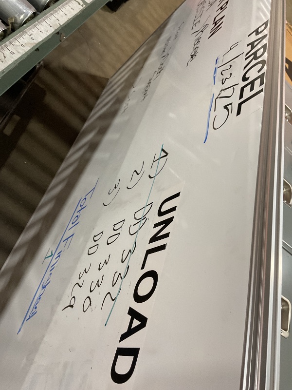 Photo 1 of **DIRT AND STICKERS*39*70 whiteboard