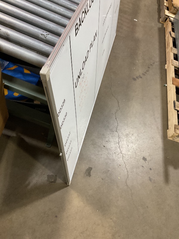 Photo 1 of **DIRT AND STICKERS*39*70 whiteboard