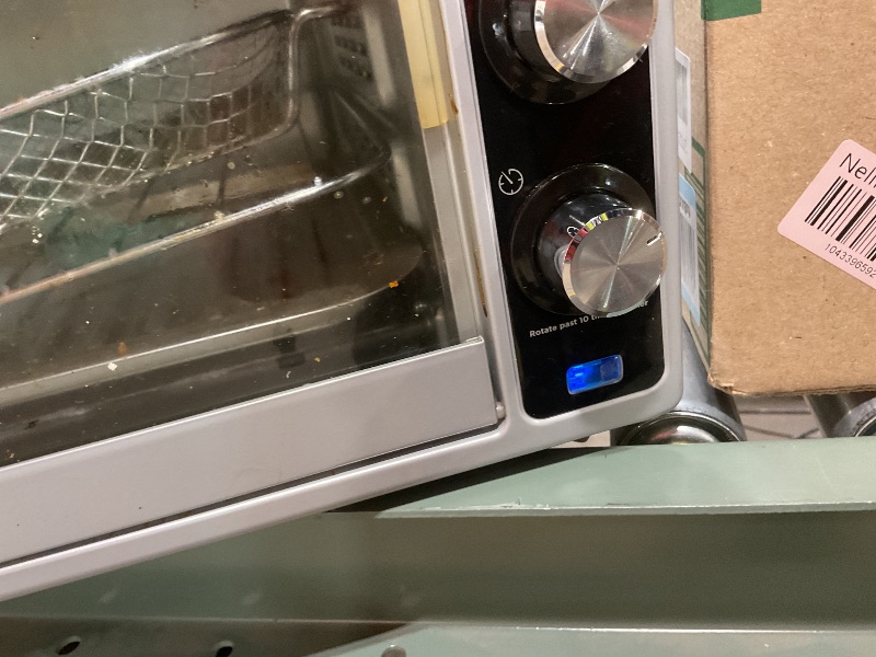 Photo 1 of **DIRT**Amazon Basics 6-Slice 23-QT Toaster Oven with Built-In Air Fryer, 7-In-1 Cooking Options, 60-Min Timer & Adjustable Temperature (200? - 450?), With Accessories, 1500W, Stainless Steel, Silver/Gray