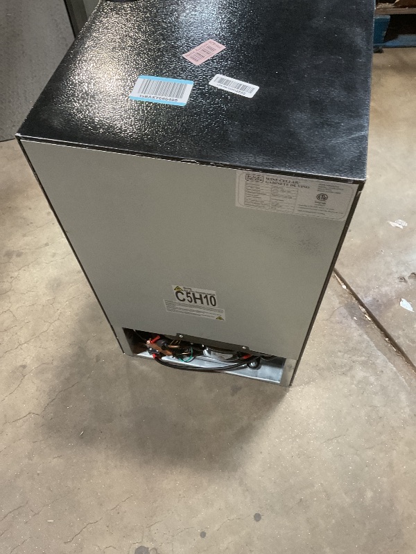 Photo 1 of **SCRAPES AND DIRT**BLACK+DECKER BD61526 Wine Cellar, Black Cabinet with Gray Door Accent