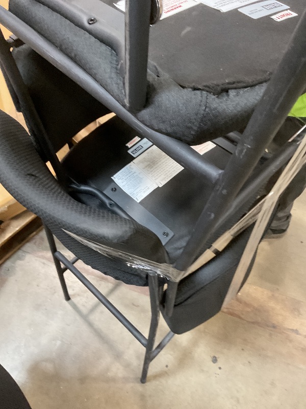 Photo 1 of **HEAVY DAMAGE USE ON FRAMES**6 black chairs. Black metal frame with black cushions 