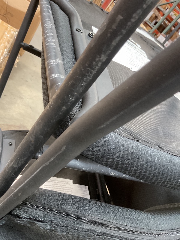 Photo 1 of **HEAVY DAMAGE USE ON FRAMES**6 black chairs. Black metal frame with black cushions 