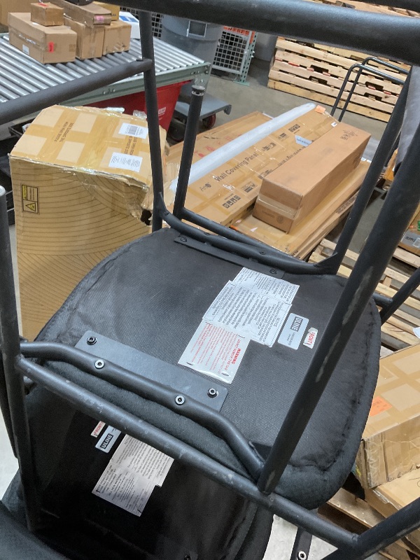 Photo 1 of **HEAVY DAMAGE USE ON FRAMES**6 black chairs. Black metal frame with black cushions 