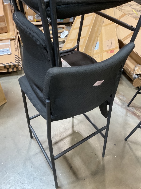 Photo 1 of **HEAVY DAMAGE USE ON FRAMES**6 black chairs. Black metal frame with black cushions 