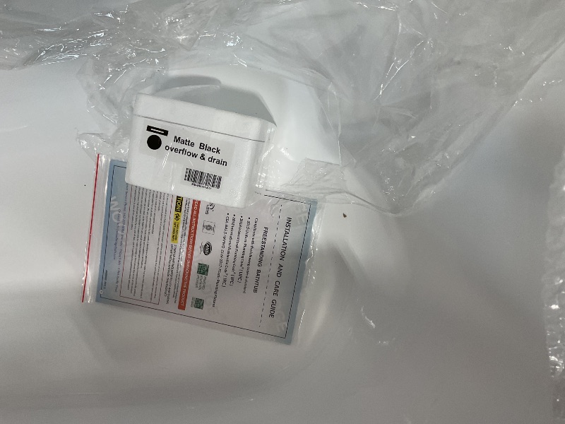 Photo 1 of ***FRAMING IS CRACKED IN THE FRONT OF TUB SHELL*** WOODBRIDGE 54" Acrylic Freestanding Bathtub Contemporary Soaking White Tub with Matte Black Overflow and Drain,B0006-MB