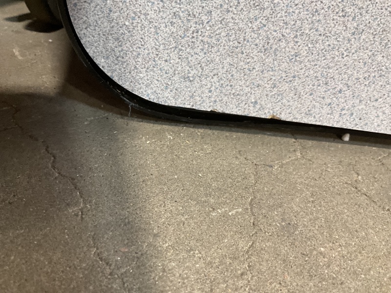Photo 1 of **SCRAPES. CORNER COMING LOOSE**60" GRAY GRANITE THERMAL-FUSED LAMINATE TOP FOLDING SEMINAR TABLE WITH PANEL LEGS