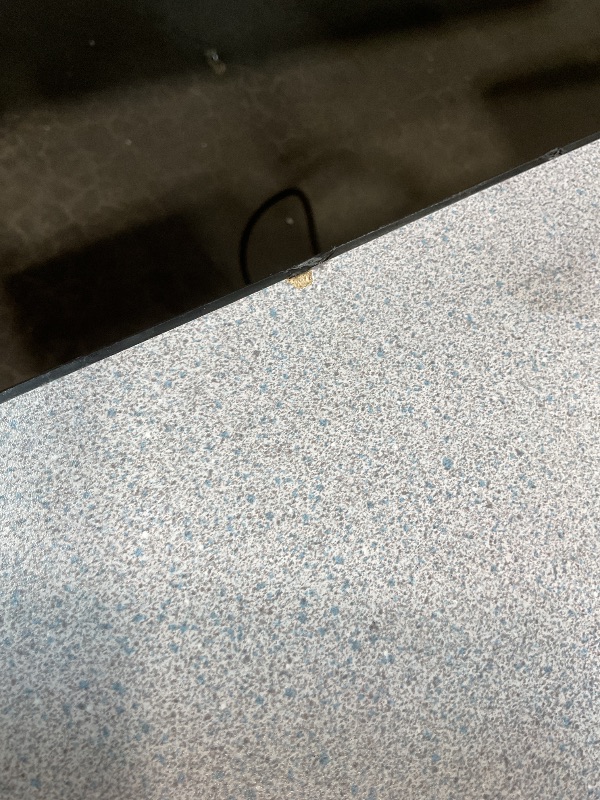 Photo 1 of **SCRATCHES. SCRAPES. CRACKING**60" GRAY GRANITE THERMAL-FUSED LAMINATE TOP FOLDING SEMINAR TABLE WITH PANEL LEGS