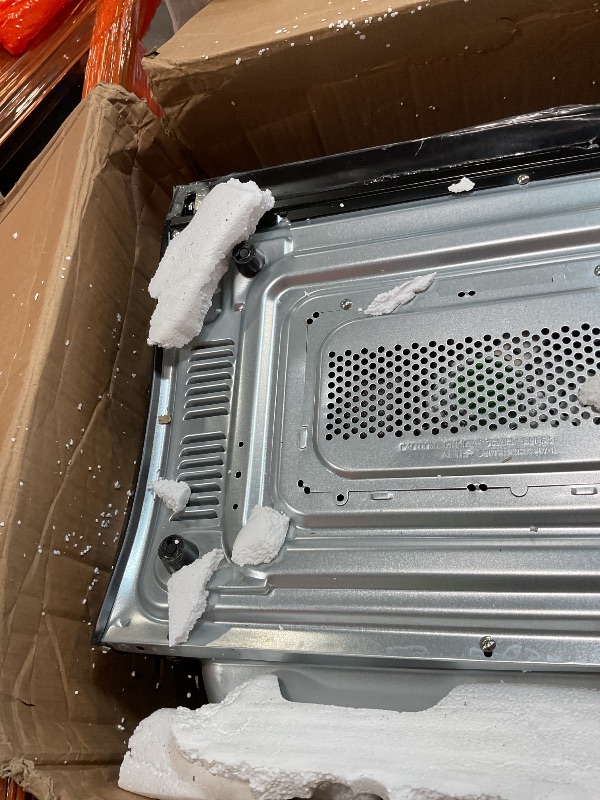 Photo 1 of **DENTED**SAMSUNG 1.2 cu. ft. Countertop Convection Microwave with Air Fry, Black Glass, MC12DB8700CKAA