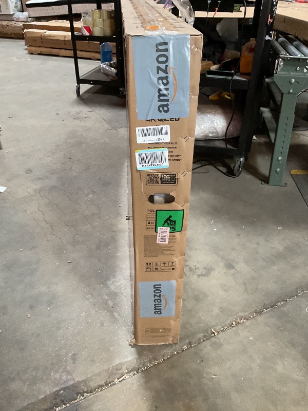 Photo 1 of **BROKEN. SELLING FOR PARTS**TCL 65-Inch Q65 QLED 4K UHD Smart TV with Google TV (65Q651G, 2024 Model) Dolby Vision, Dolby Atmos, HDR Pro+, Game Accelerator Enhanced Gaming, Voice Remote, Works with Alexa, Streaming Television