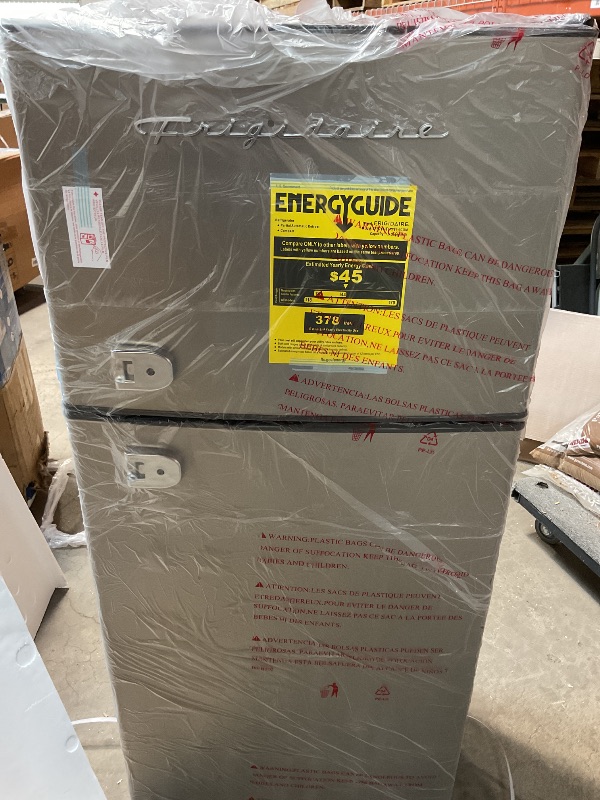 Photo 1 of **FOR PARTS ONLY/COPPER LINE TO COMPRESSOR BROKEN** Frigidaire, 2 Door Apartment Size Refrigerator/Freezer Combo, 7.5 cu ft, Platinum Series, Stainless, 23" D x 21.5" W x 55.5" H