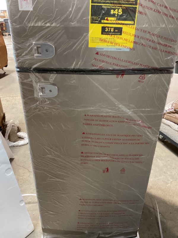 Photo 1 of **FOR PARTS ONLY/COPPER LINE TO COMPRESSOR BROKEN** Frigidaire, 2 Door Apartment Size Refrigerator/Freezer Combo, 7.5 cu ft, Platinum Series, Stainless, 23" D x 21.5" W x 55.5" H