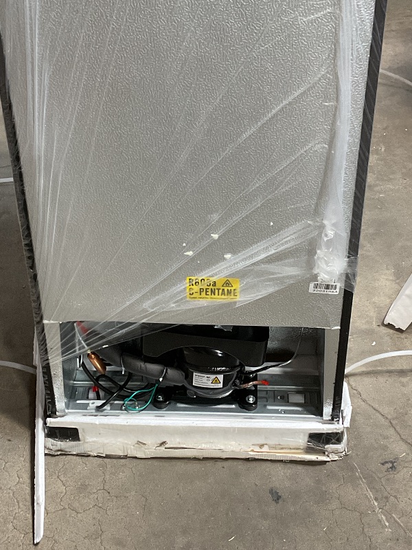Photo 1 of **FOR PARTS ONLY/COPPER LINE TO COMPRESSOR BROKEN** Frigidaire, 2 Door Apartment Size Refrigerator/Freezer Combo, 7.5 cu ft, Platinum Series, Stainless, 23" D x 21.5" W x 55.5" H
