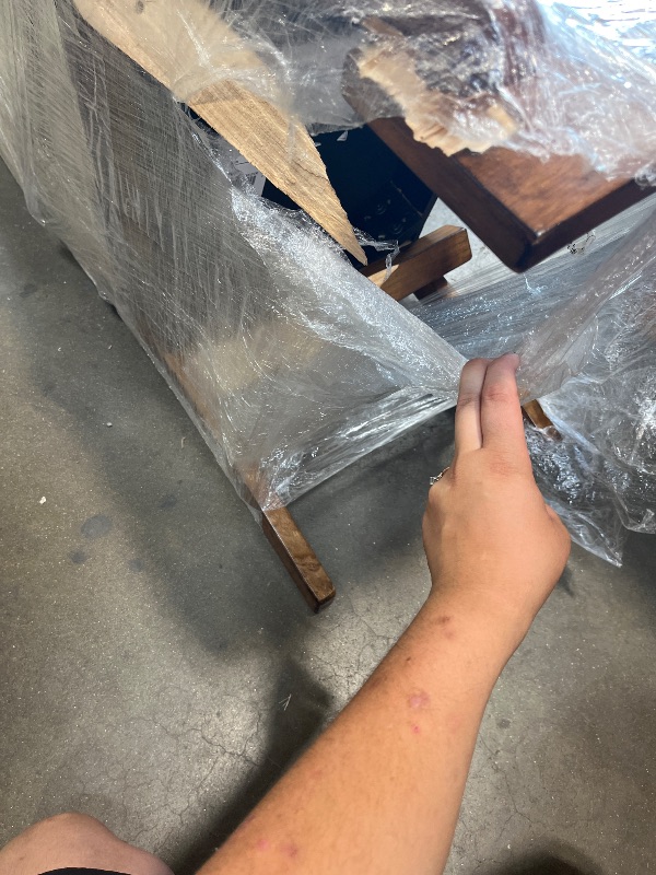 Photo 1 of ** 1Chair has broken leg** 
2 chairs total
Signature Design by Ashley Ralene Rake Back 19" Dining Room Chair 2 Count, Medium Brown