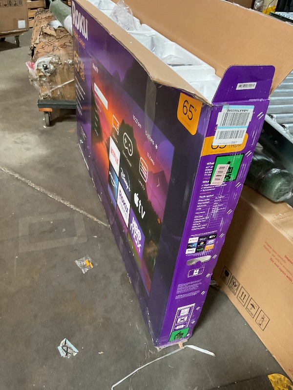 Photo 1 of **DAMAGED. SELLING FOR PARTS**Roku Smart TV – 65-Inch Select Series 4K HDR RokuTV with Roku Enhanced Voice Remote, Brilliant 4K Picture, Automatic Brightness, & Seamless Streaming – Live Local News, Sports, Family Entertainment