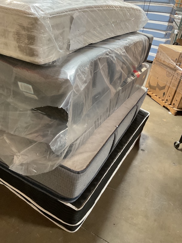 Photo 1 of **DIRTY FROM TRANSPORT // WIL NEED A TRUCK TO PICKUP ****Pallet of 5 mattresses.