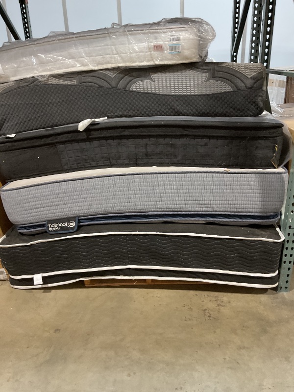 Photo 1 of **DIRTY FROM TRANSPORT // WIL NEED A TRUCK TO PICKUP ****Pallet of 5 mattresses.