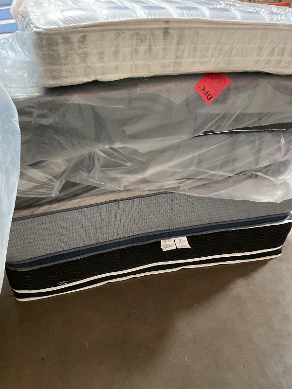 Photo 1 of **DIRTY FROM TRANSPORT // WIL NEED A TRUCK TO PICKUP ****Pallet of 5 mattresses.