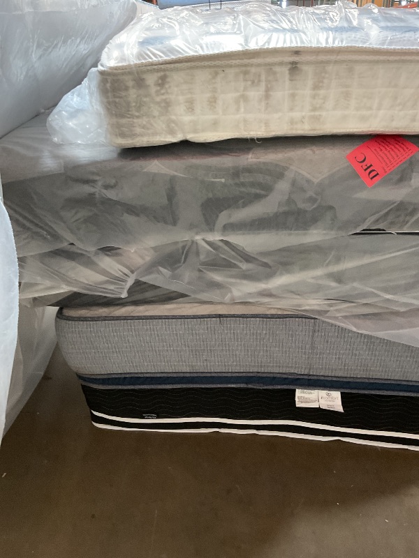 Photo 1 of **DIRTY FROM TRANSPORT // WIL NEED A TRUCK TO PICKUP ****Pallet of 5 mattresses.