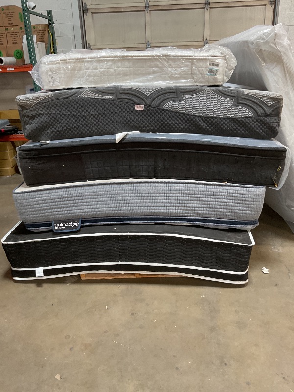 Photo 1 of **DIRTY FROM TRANSPORT // WIL NEED A TRUCK TO PICKUP ****Pallet of 5 mattresses.