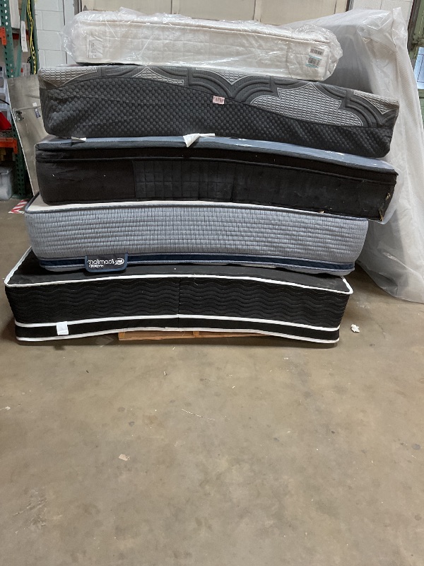 Photo 1 of **DIRTY FROM TRANSPORT // WIL NEED A TRUCK TO PICKUP ****Pallet of 5 mattresses.