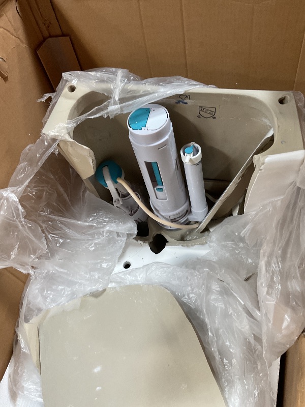 Photo 1 of **SELLING FOR PARTS. MAJOR DAMAGE**Swiss Madison St. Tropez SM-1T251 One-Piece Elongated Toilet 14" Rough-in Vortex Dual-Flush 1.1/1.6 gpf with Comfort Chair Seat ADA Height in Glossy White