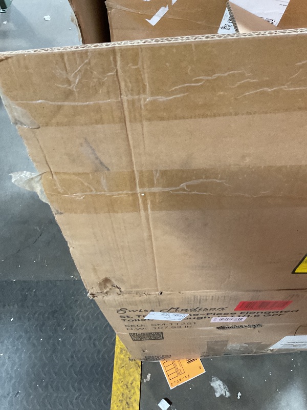 Photo 1 of **SELLING FOR PARTS. MAJOR DAMAGE**Swiss Madison St. Tropez SM-1T251 One-Piece Elongated Toilet 14" Rough-in Vortex Dual-Flush 1.1/1.6 gpf with Comfort Chair Seat ADA Height in Glossy White