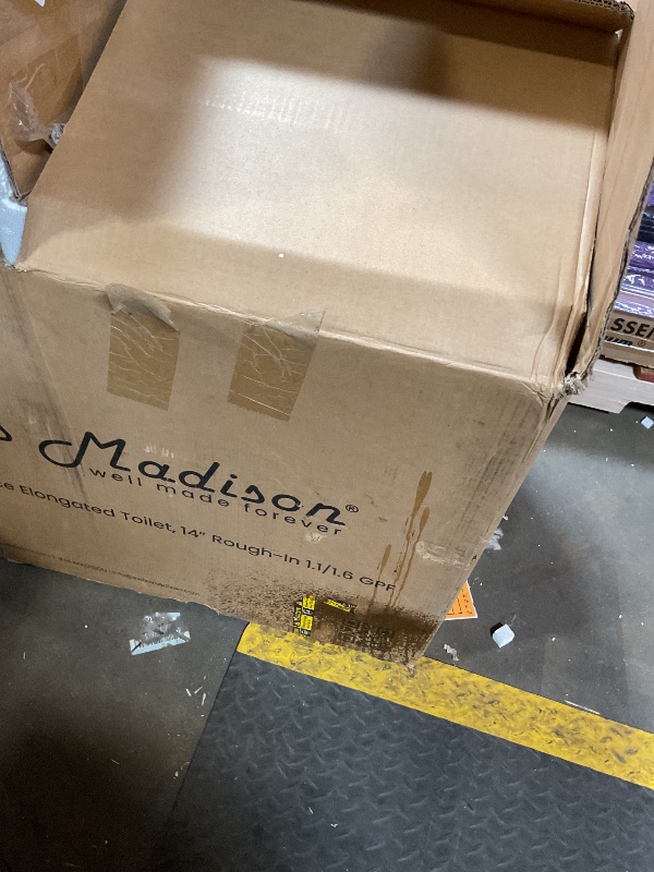 Photo 1 of **SELLING FOR PARTS. MAJOR DAMAGE**Swiss Madison St. Tropez SM-1T251 One-Piece Elongated Toilet 14" Rough-in Vortex Dual-Flush 1.1/1.6 gpf with Comfort Chair Seat ADA Height in Glossy White