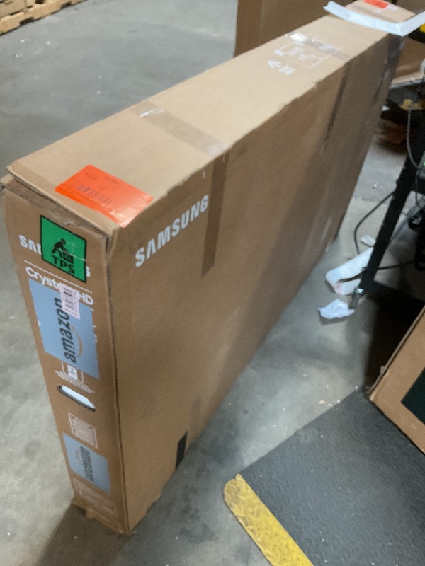 Photo 1 of **MAJOR DAMAGE. SELLING FOR PARTS**Samsung 65-Inch Class Crystal UHD 4K DU7200 Series HDR Smart TV w/Object Tracking Sound Lite, PurColor, Motion Xcelerator, Mega Contrast, Q-Symphony (UN65DU7200, 2024 Model)
