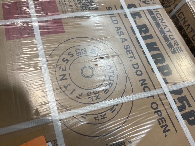 Photo 1 of **WILL NEED A TRUCK TO PICKUP**One pallet of 24 boxes. Each box has two 25lb weights