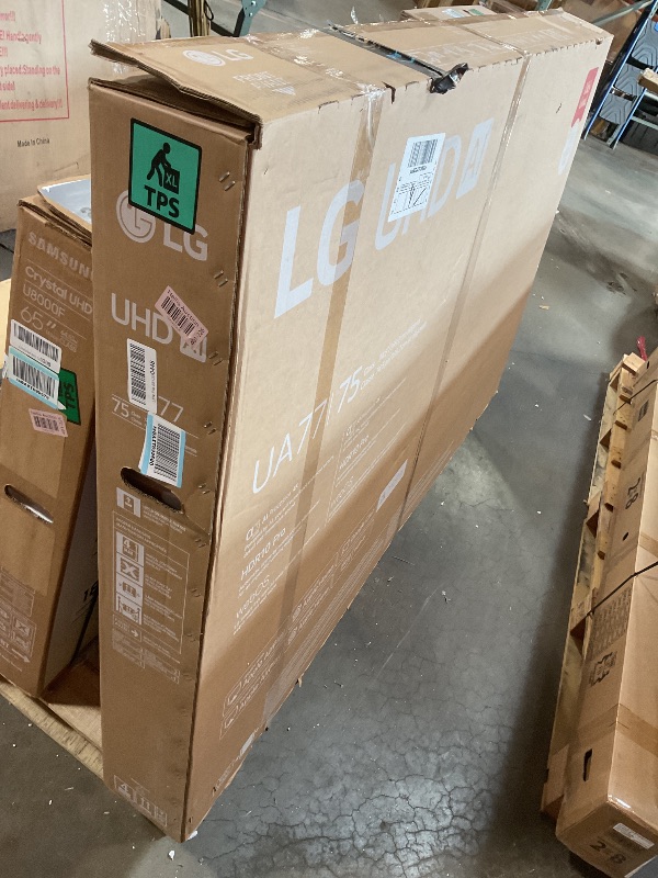 Photo 1 of **SELLING FOR PARTS. MAJOR DAMAGE **LG 75-Inch Class UHD AI 4K UA77 Series Smart TV w/AI Sound Pro, HDR10, 4K Super Upscaling, Filmmaker Mode, Wow Orchestra, Compatible with Alexa (75UA7700PUA, 2025)